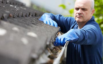 cleaning and inspecting Pont Rug roofs